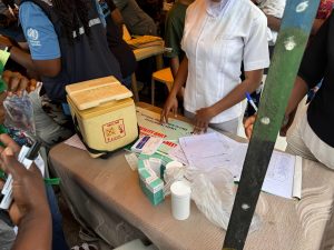 At the launch of the Oyo State integrated campaign in October 2025, the state healthcare team prepares supplies during the integrated campaign in October 2025, including vaccines, albendazole, and recordkeeping tools. Photo Credit: Destiny Chukwu.